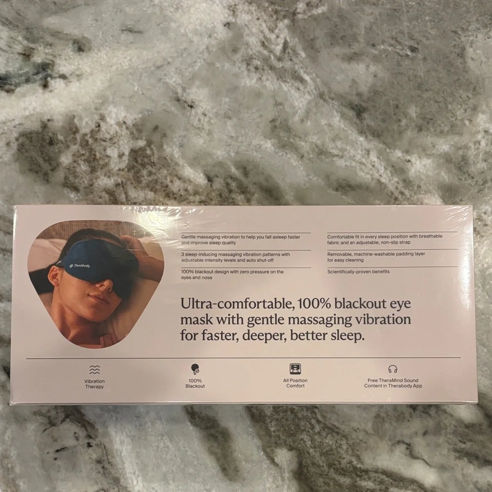 Therabody SleepMask Eye Mask in Black and Pale Pink Box